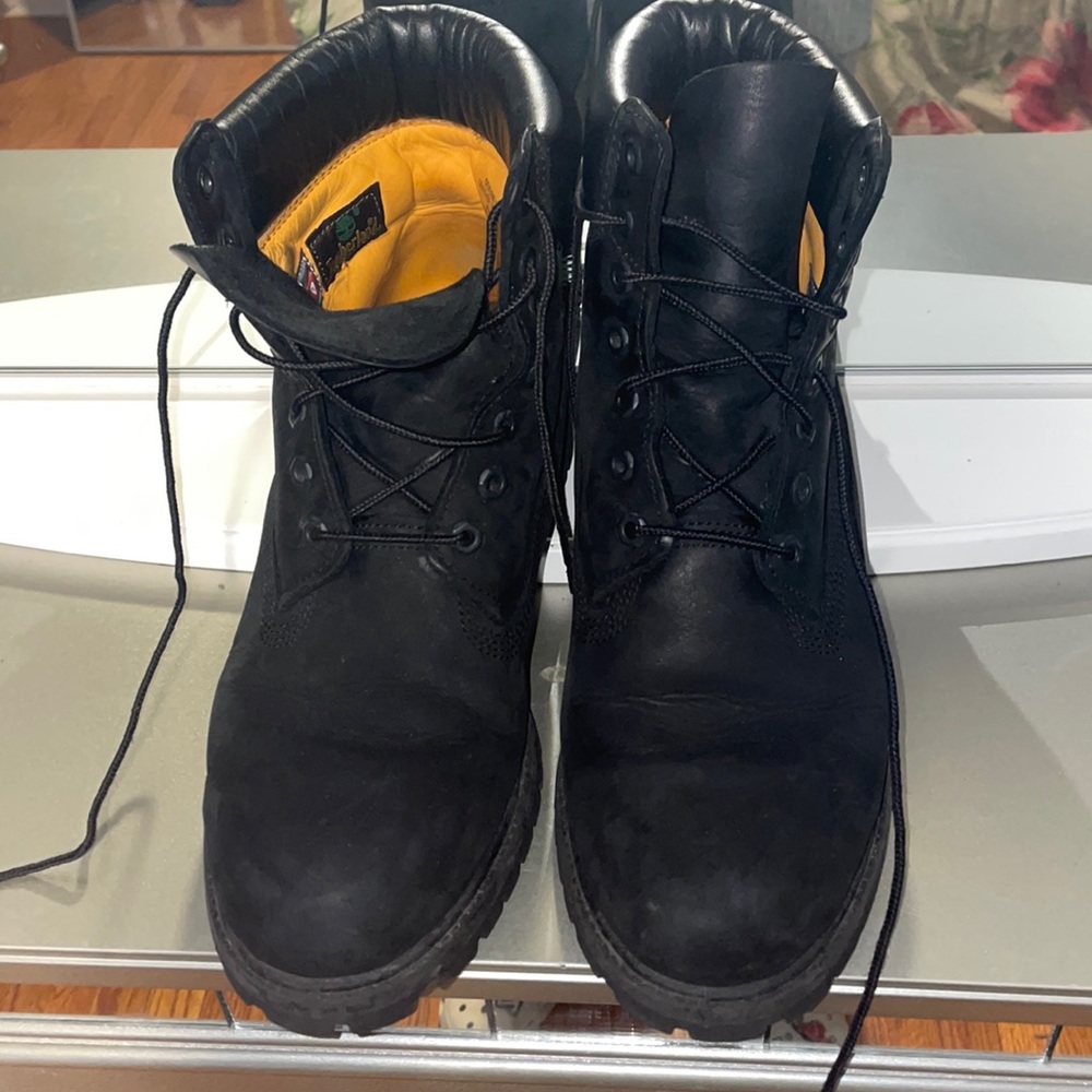 Black high top Tim’s
